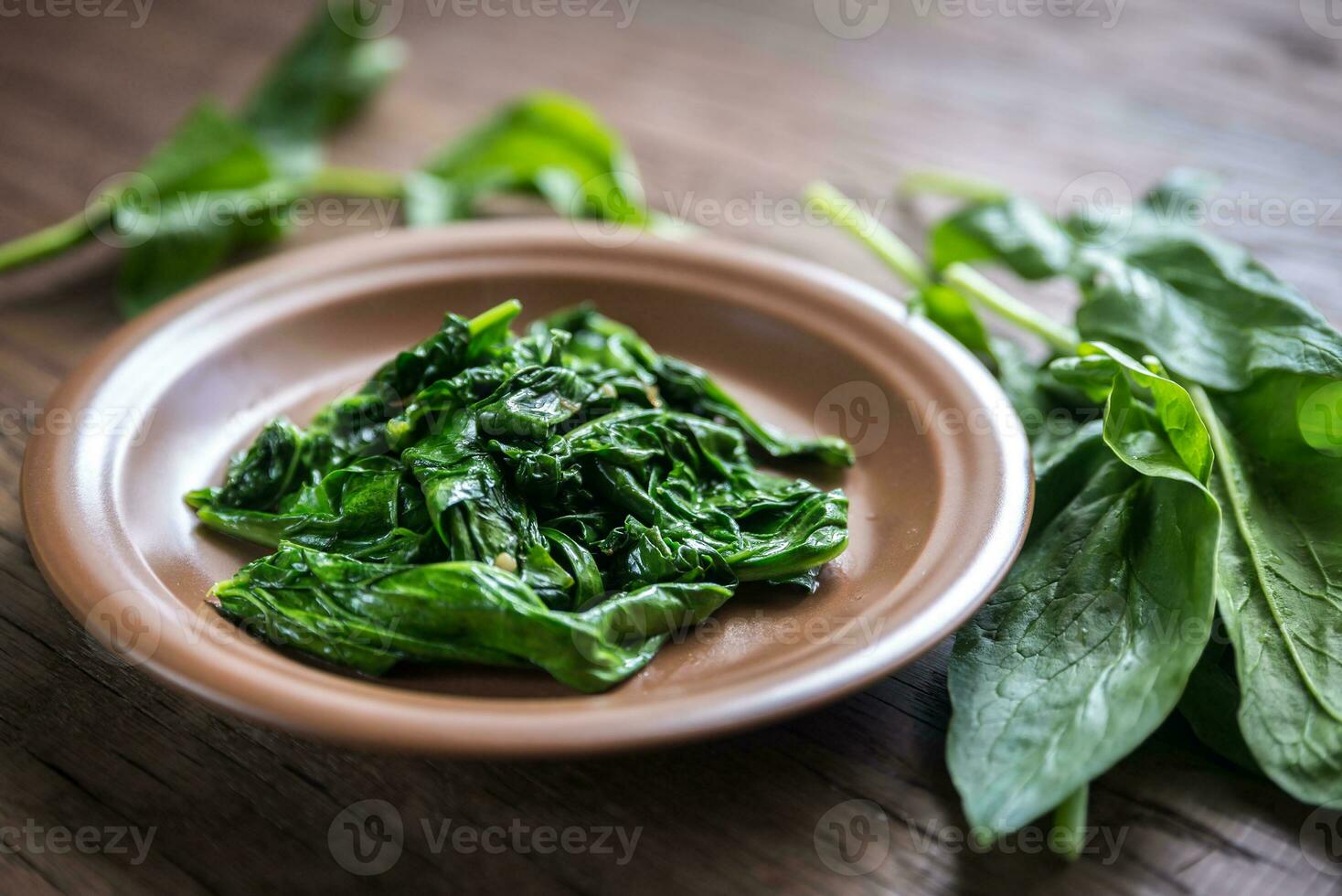 Portion of cooked spinach photo