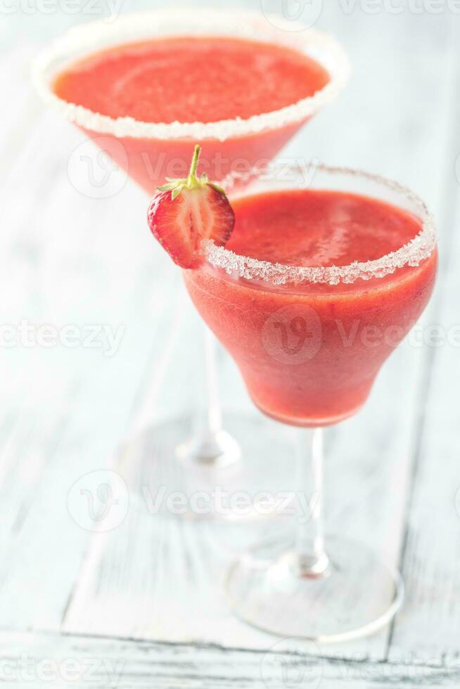 Two glasses of strawberry margarita cocktail photo