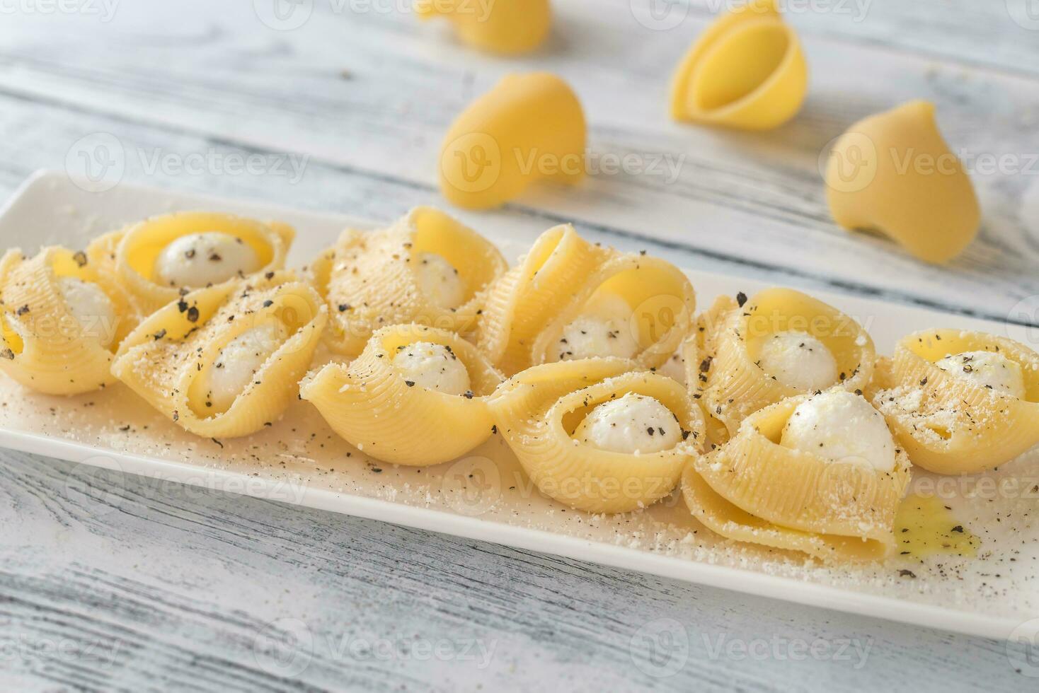 Lumaconi pasta stuffed with bocconcini photo