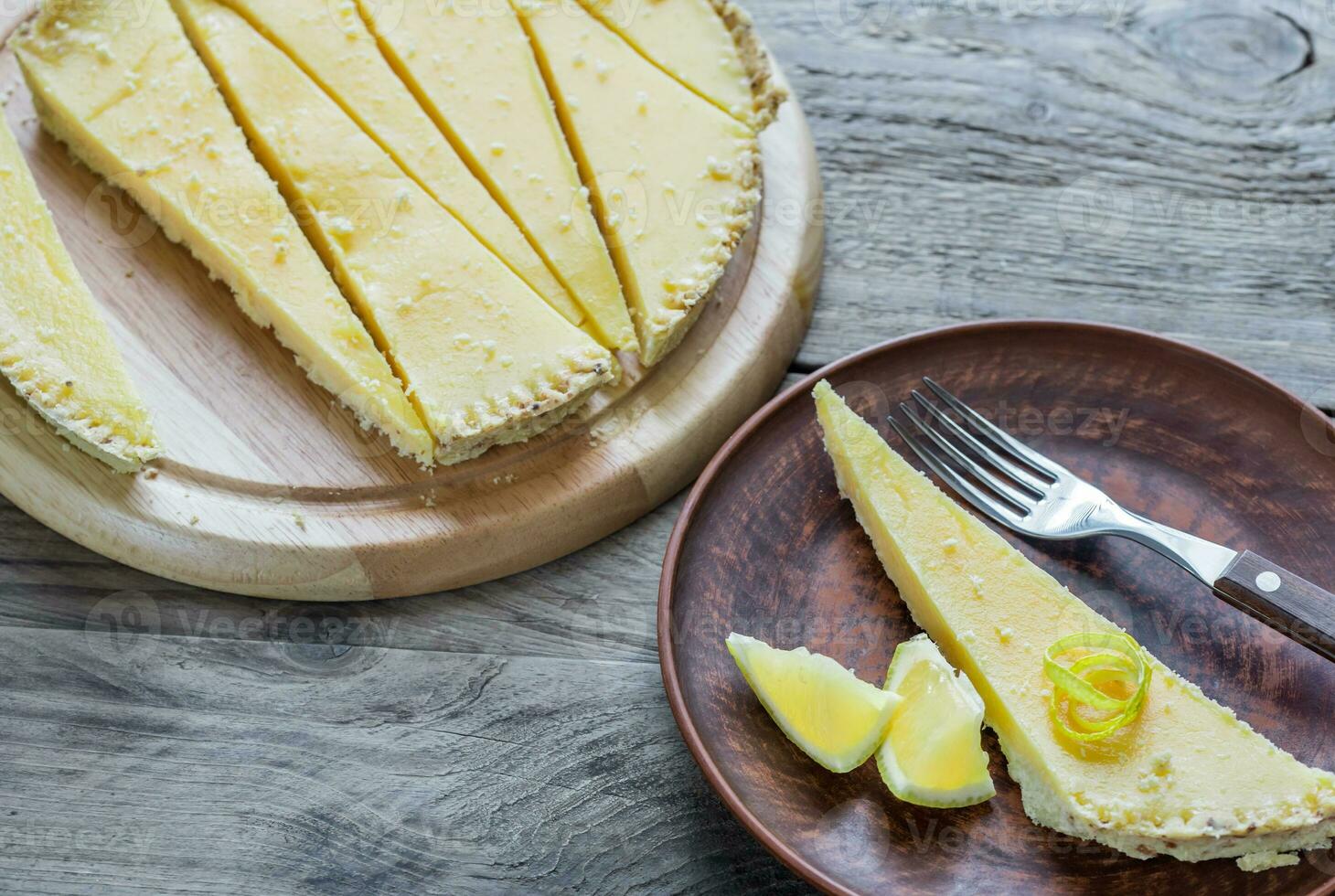 Portion of lemon tart on the plate photo