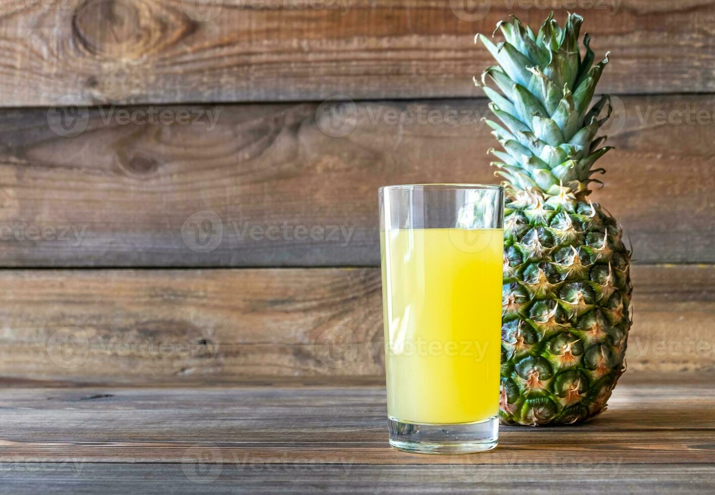 Glass of pineapple juice photo