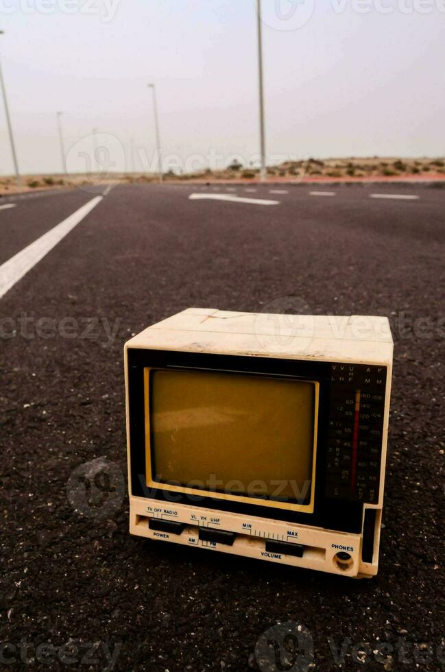 Vintage TV on the ground photo