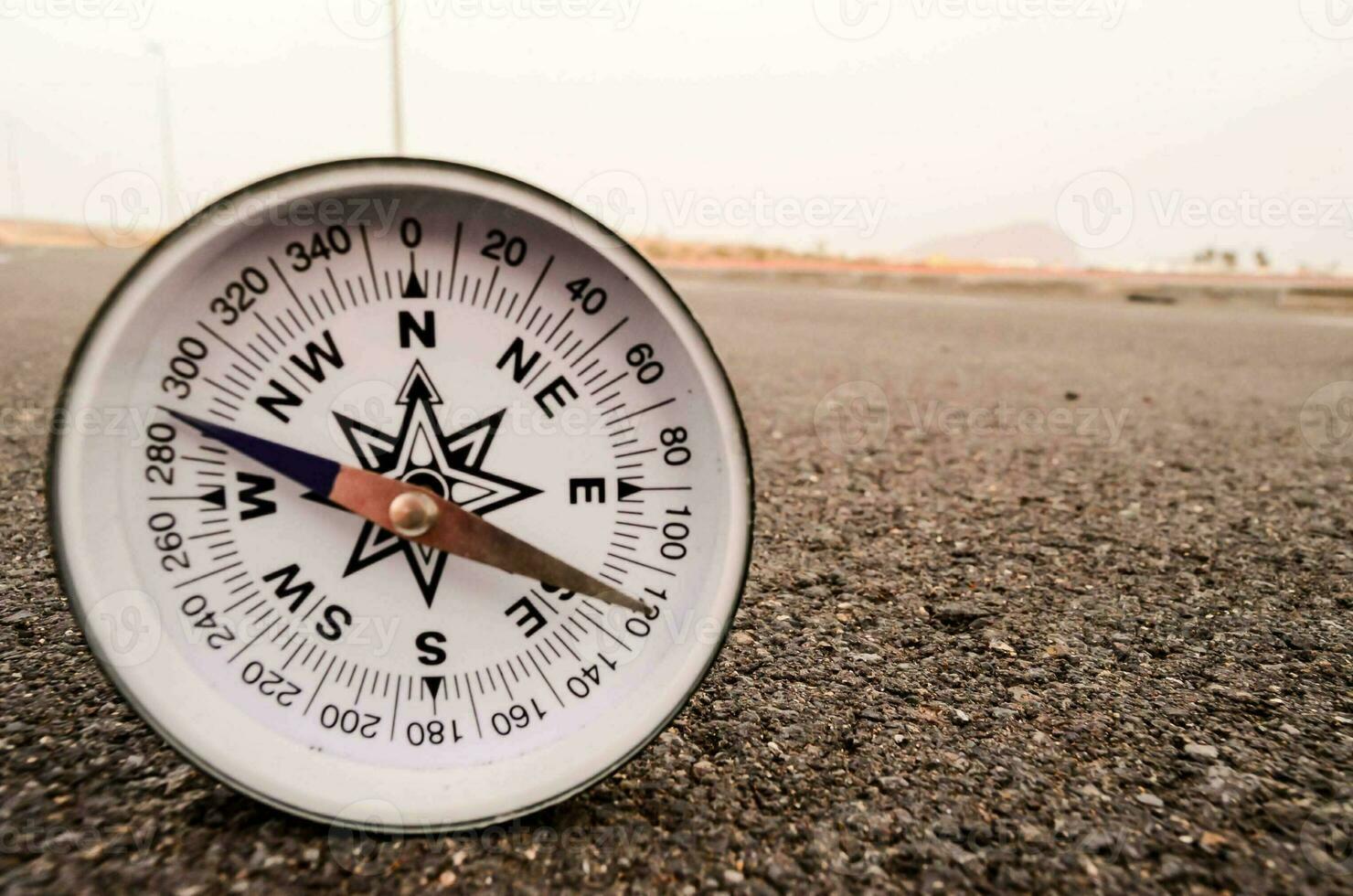 Compass on the ground photo