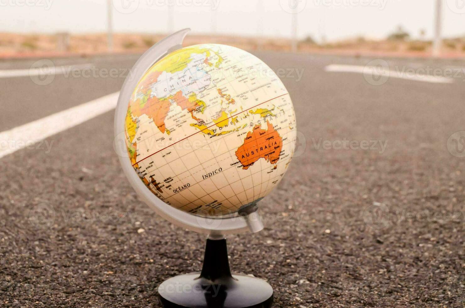 Globe on the road photo