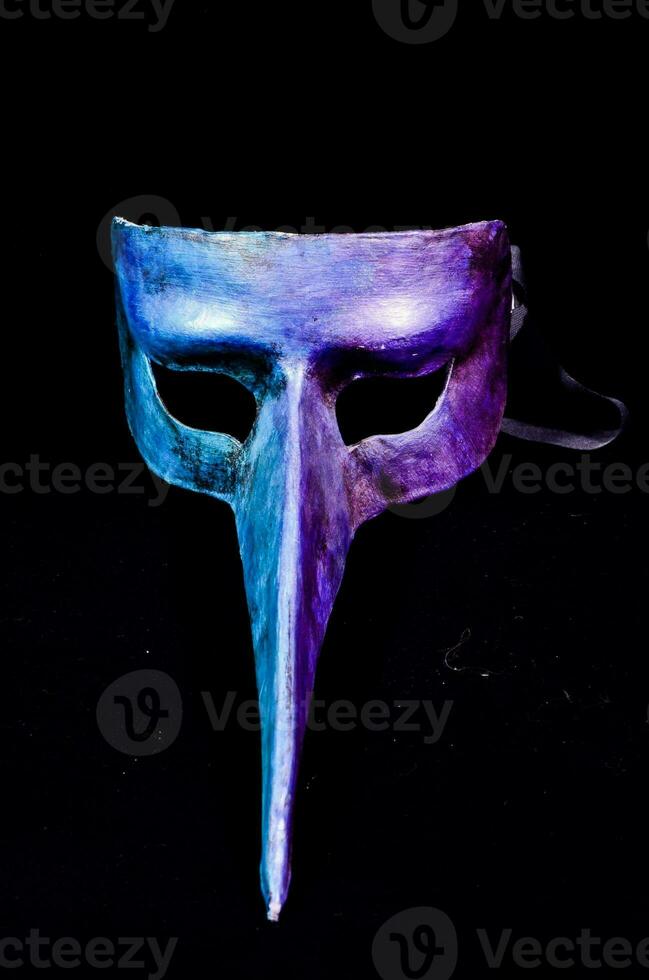 Carnival mask with long nose photo