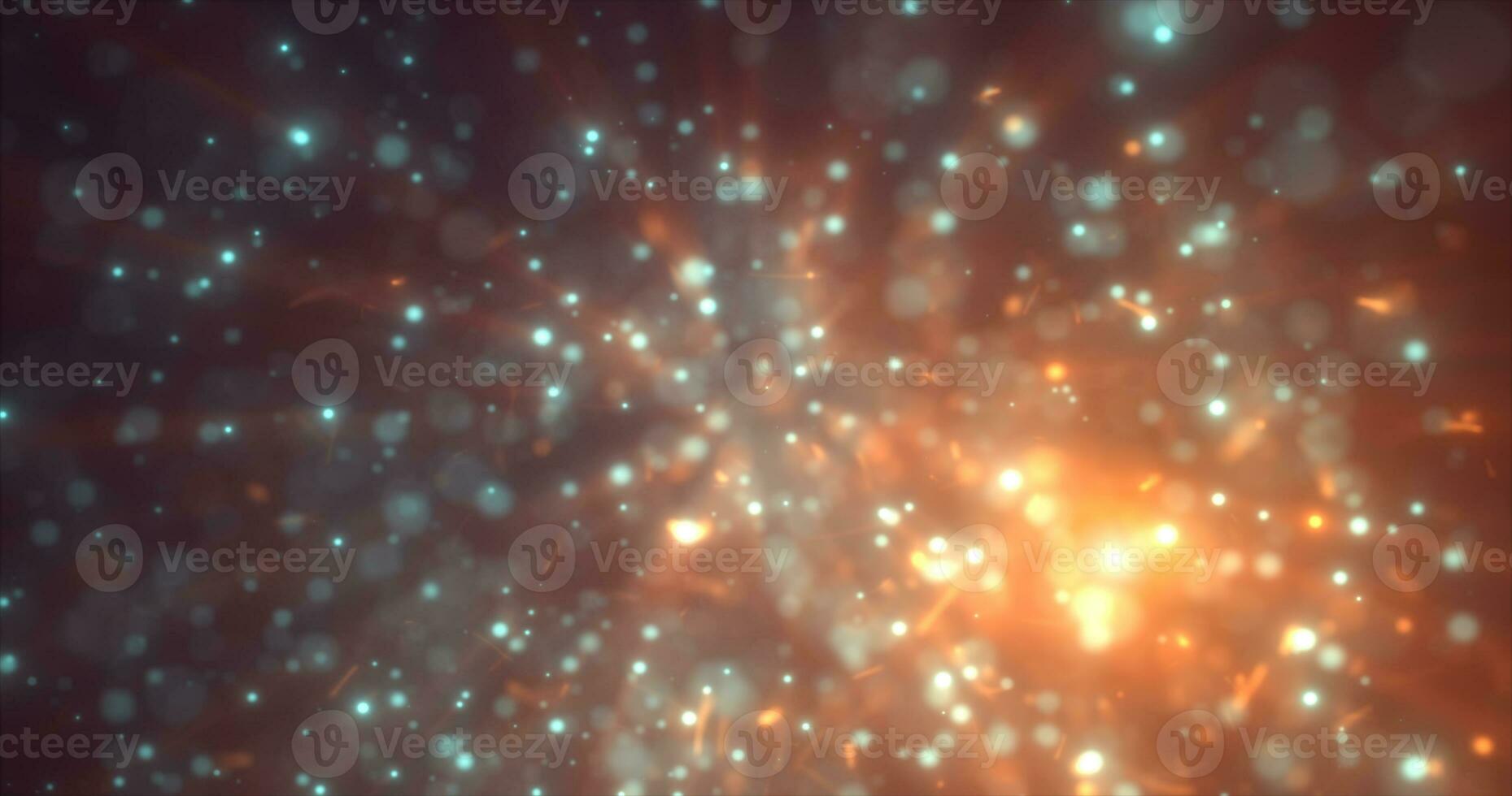 Abstract yellow orange energy particles and dots glowing flying sparks festive with bokeh effect and blur background photo