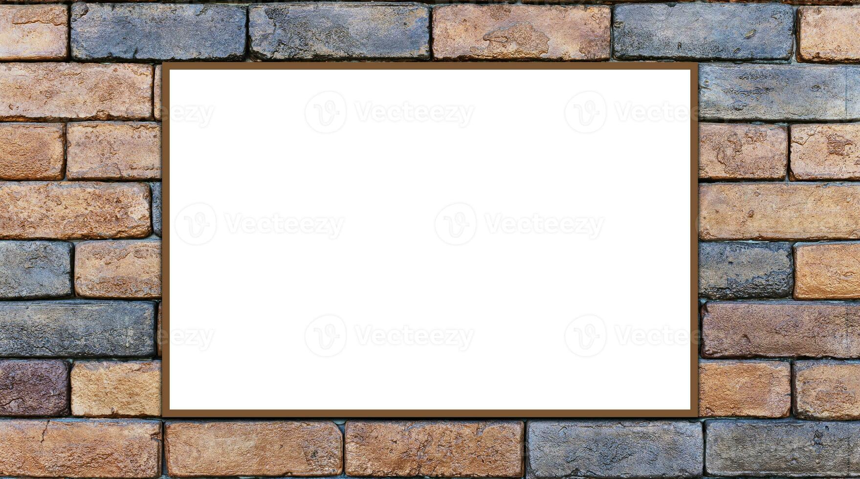 Mockup white picture frame on orange brick wall background with clipping path photo