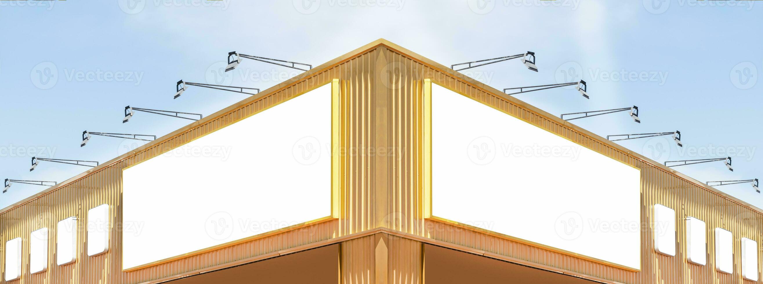 Two billboard white background  on yellow and red building with spot light photo