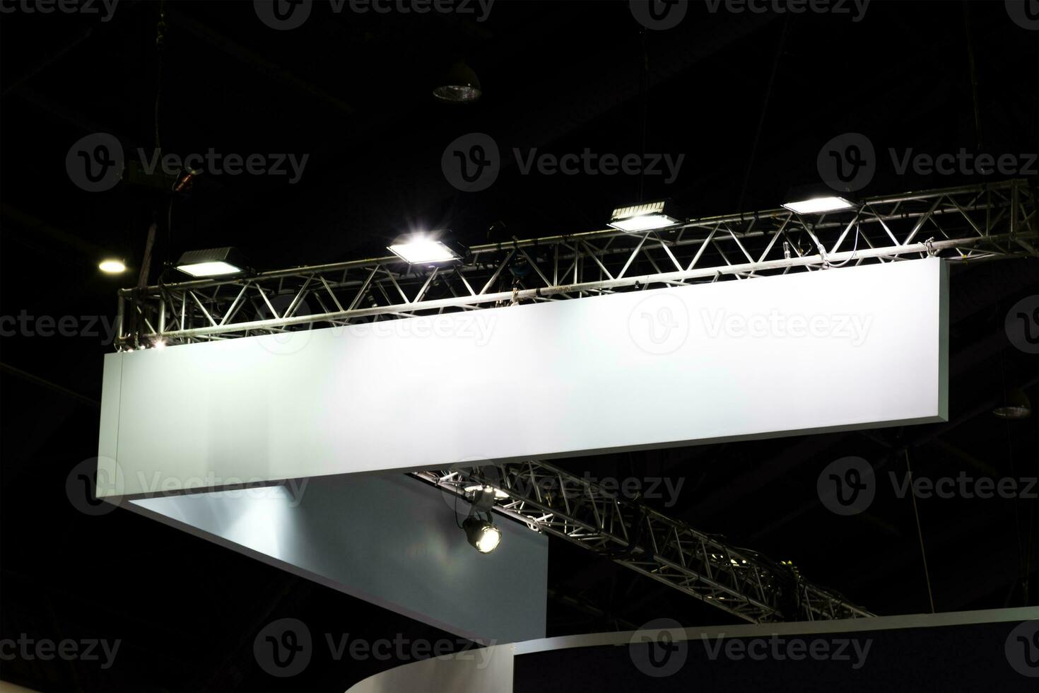 Hanging white indoor billboard with spot light photo