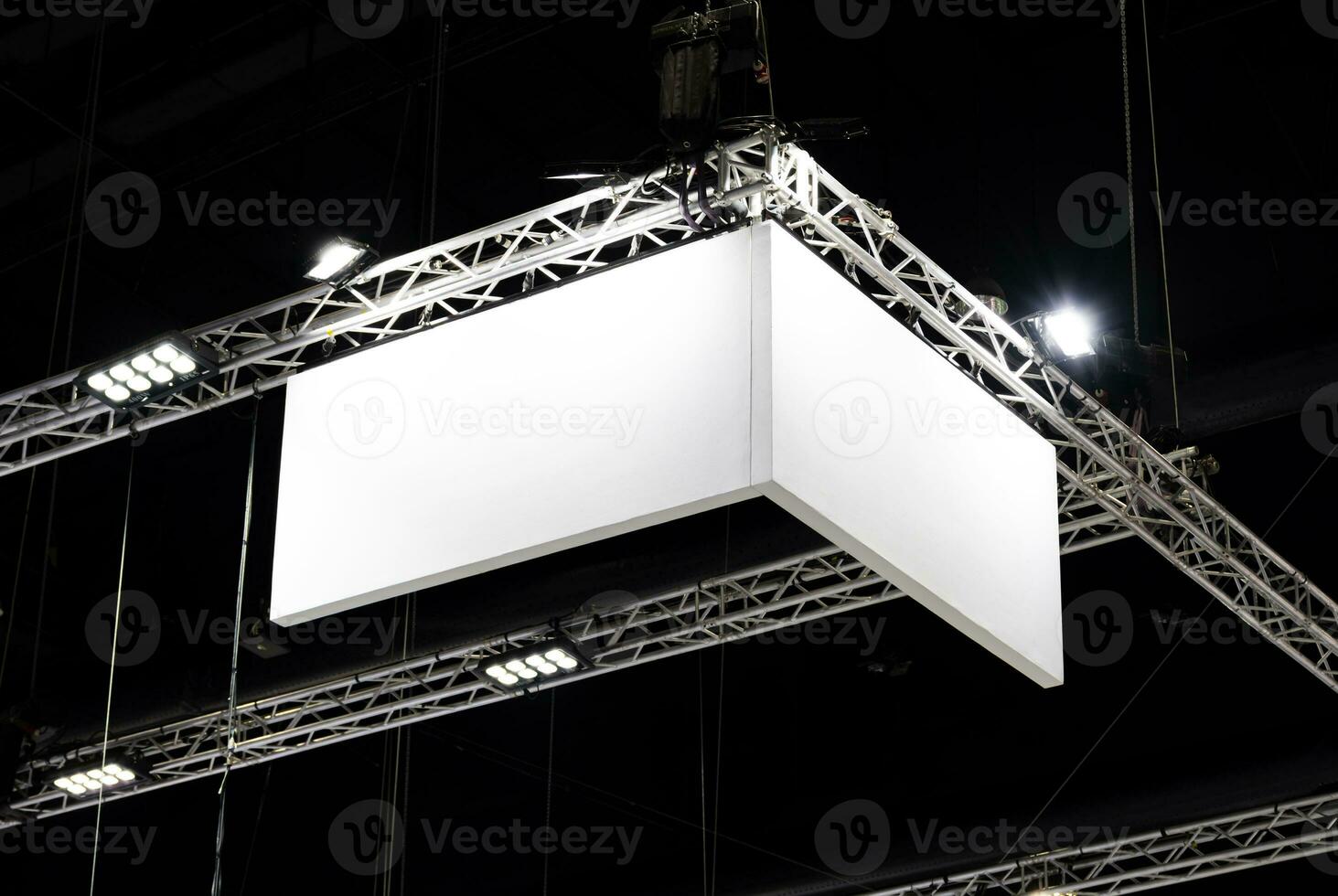 Hanging white indoor billboard with spot light photo