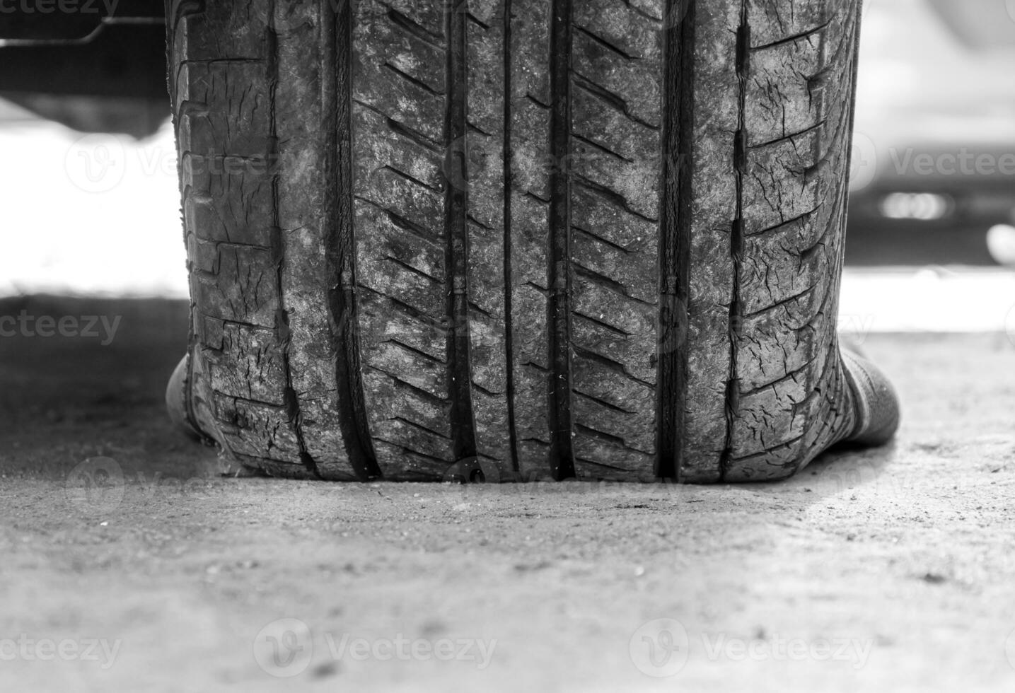 Close up old tire and leaking photo