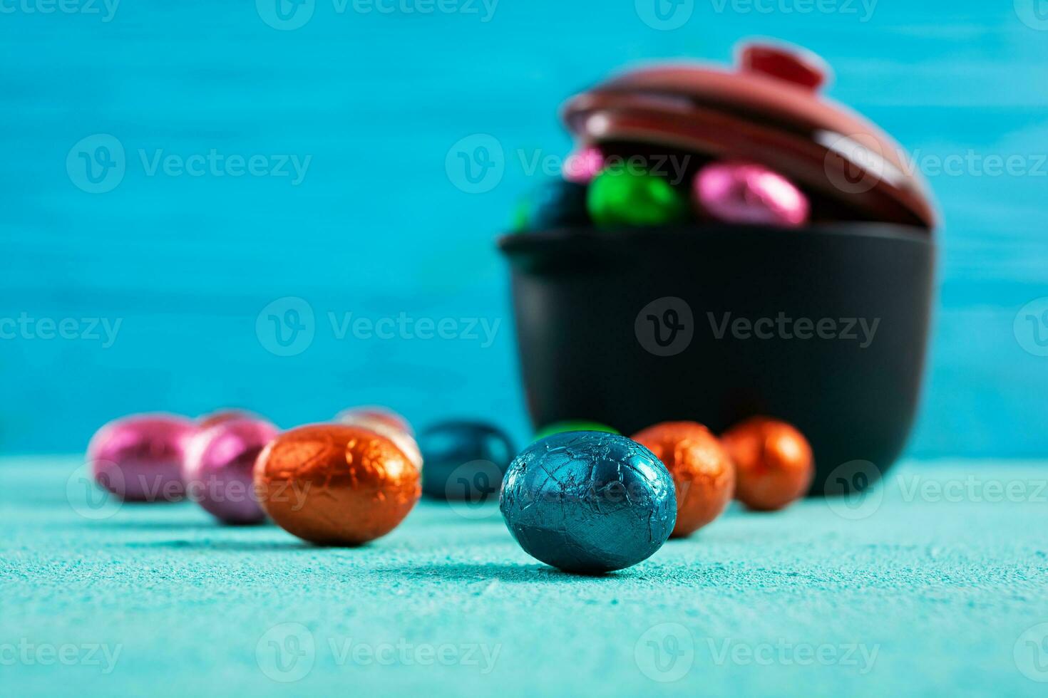 Colorful background of Easter chocolate eggs. Delicious chocolate eggs photo