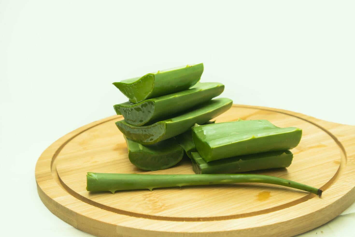 aloe vera on the wooden plate, closeup of photograph photo