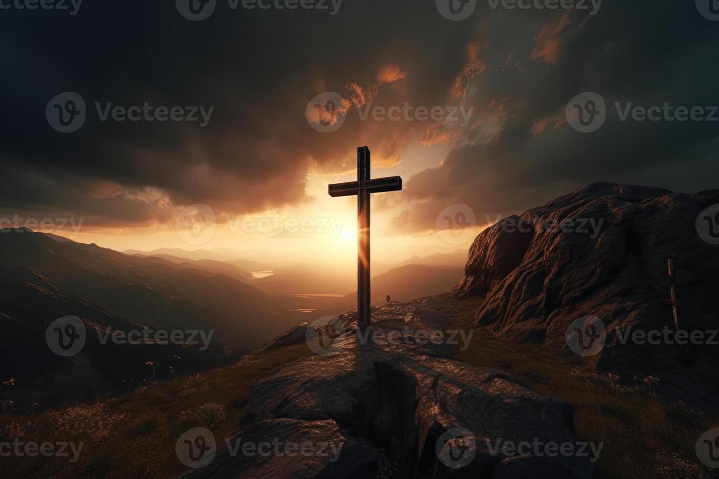 Cross on the top of the mountain with sunset background. photo