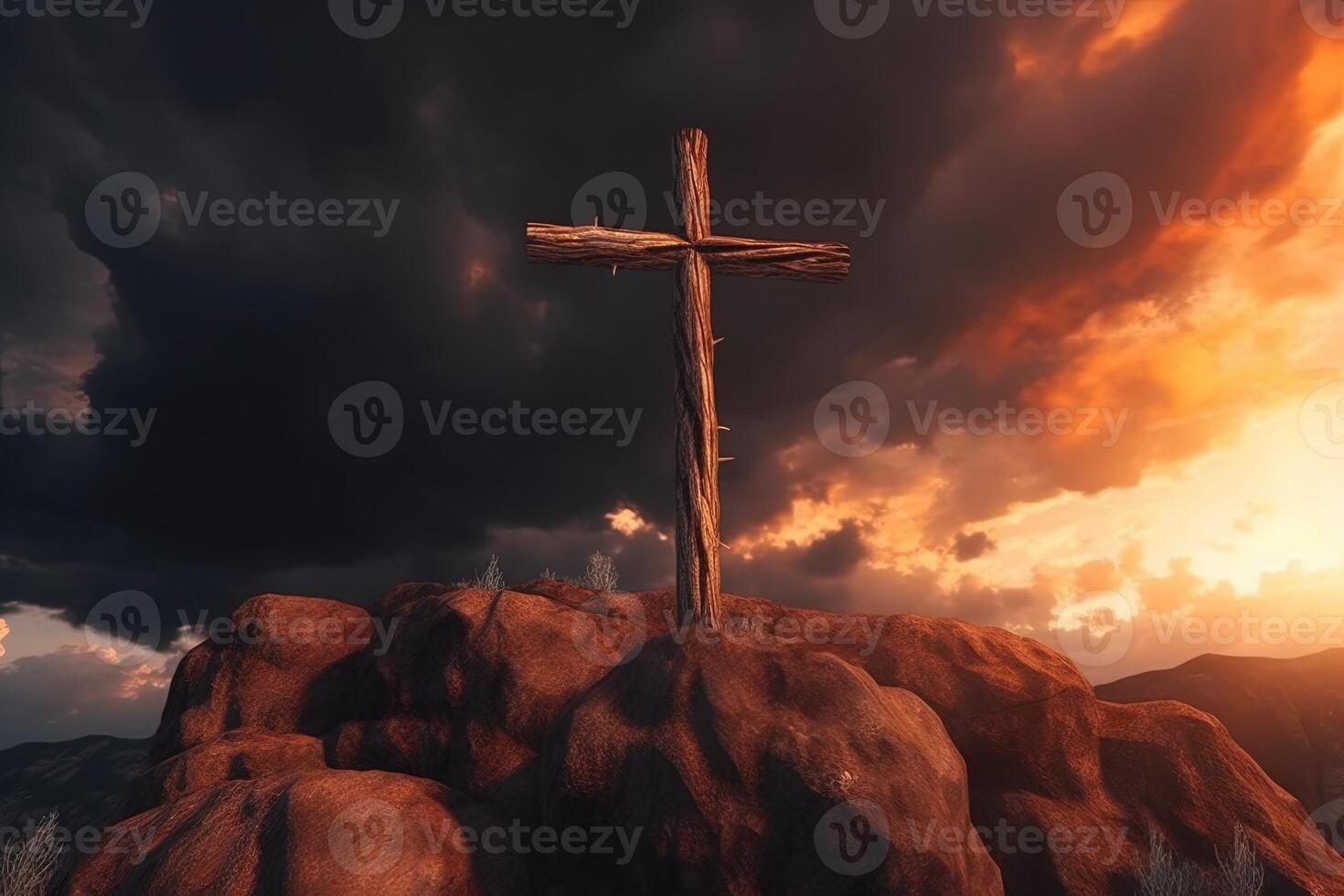 Cross on the top of the mountain with sunset background. photo