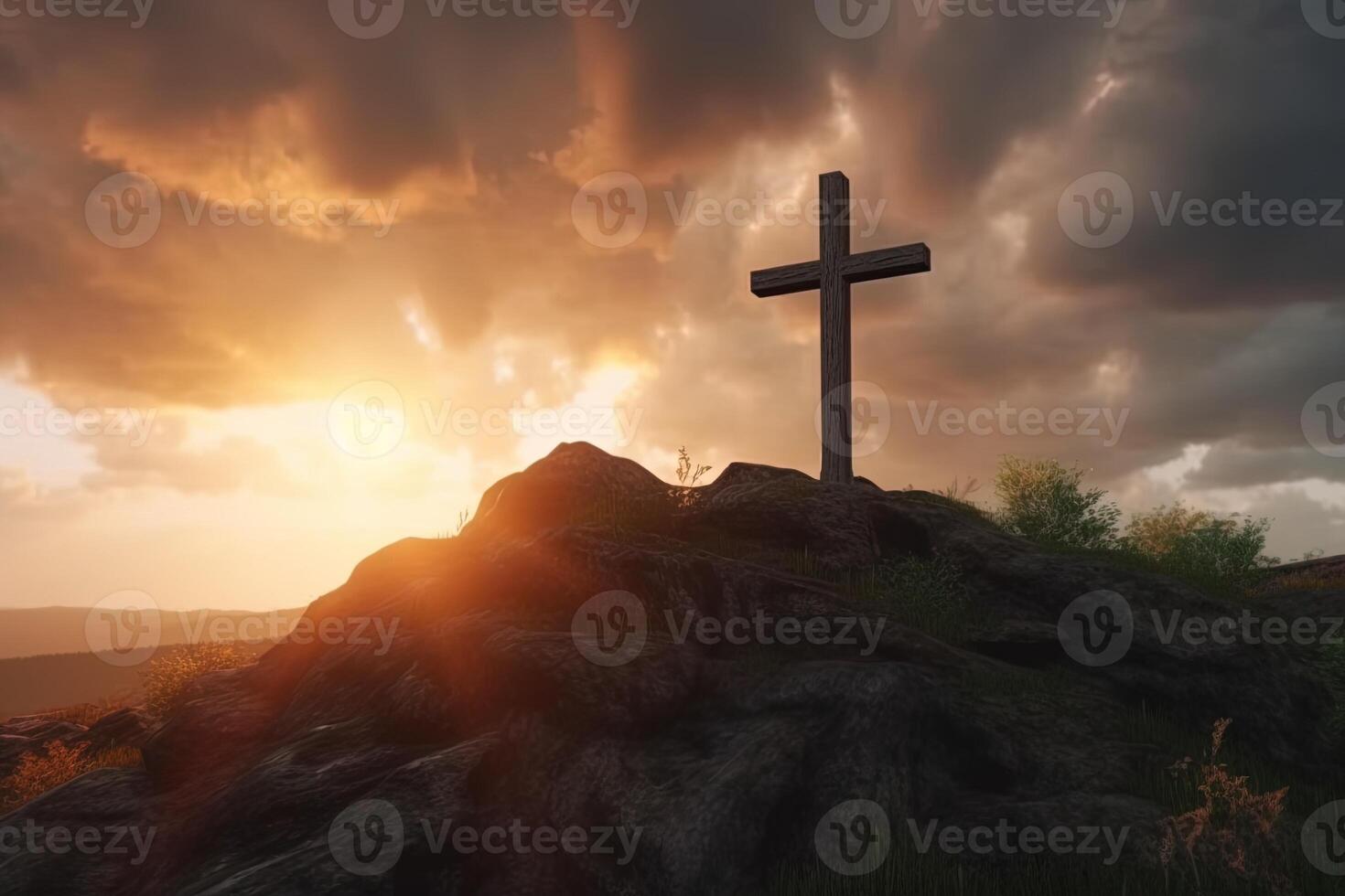 Cross on the top of the mountain with sunset background. photo