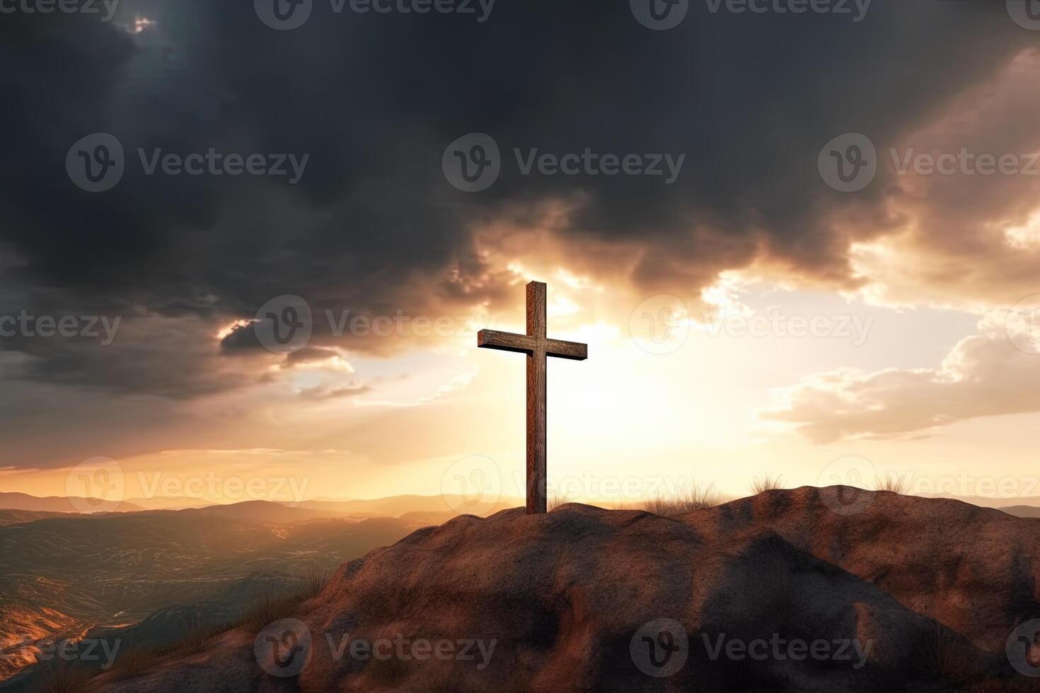Cross on the top of the mountain with sunset background. photo