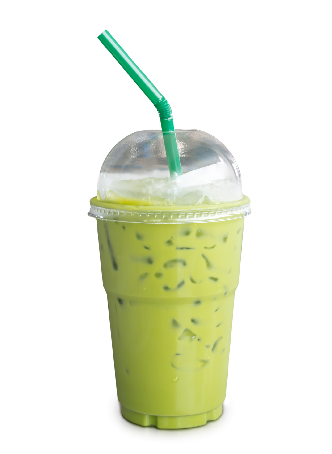Iced matcha green tea with condensed milk in transparent plastic glass