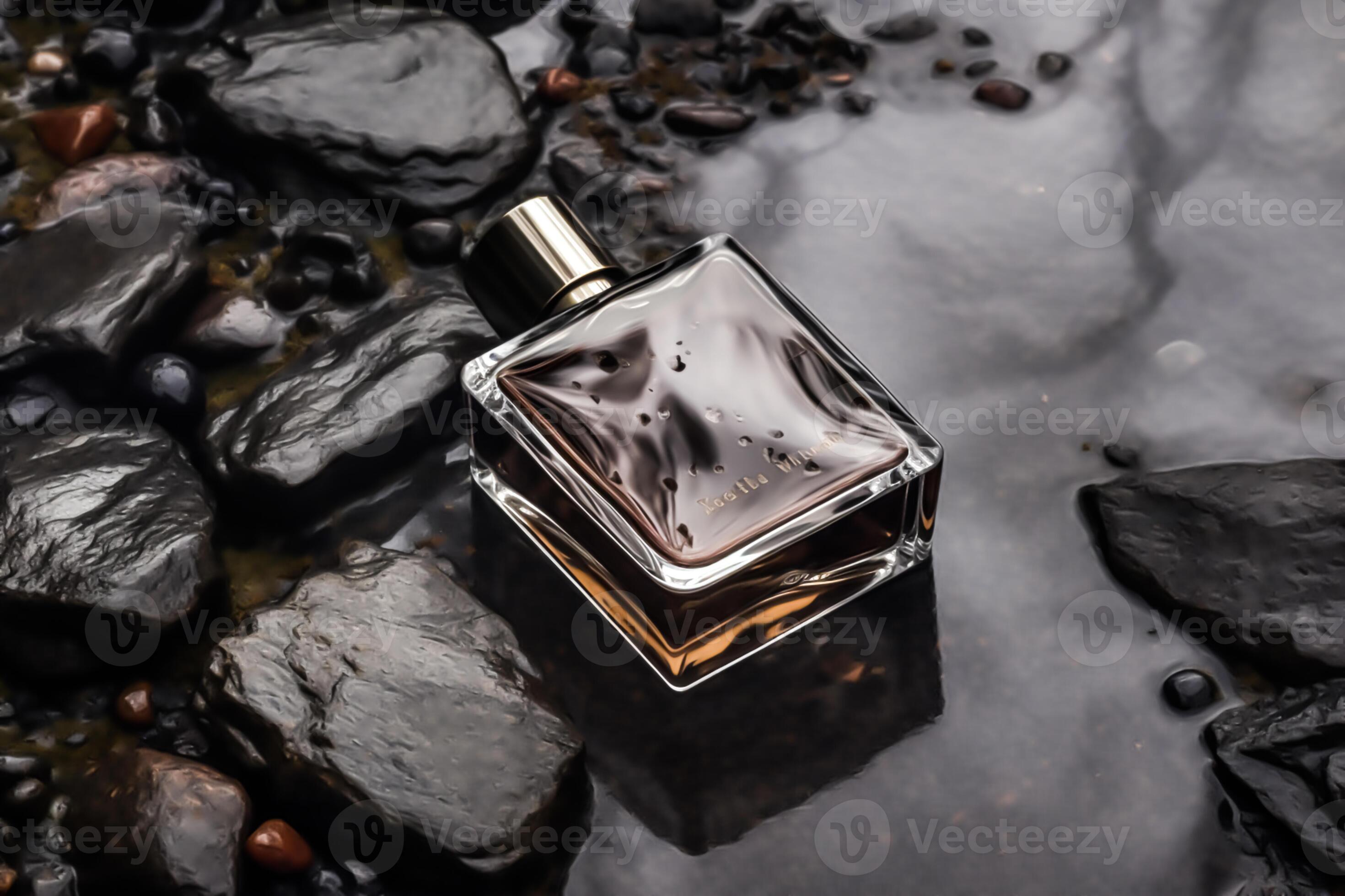 Modern glass men perfume bottle among black rocks in the rain