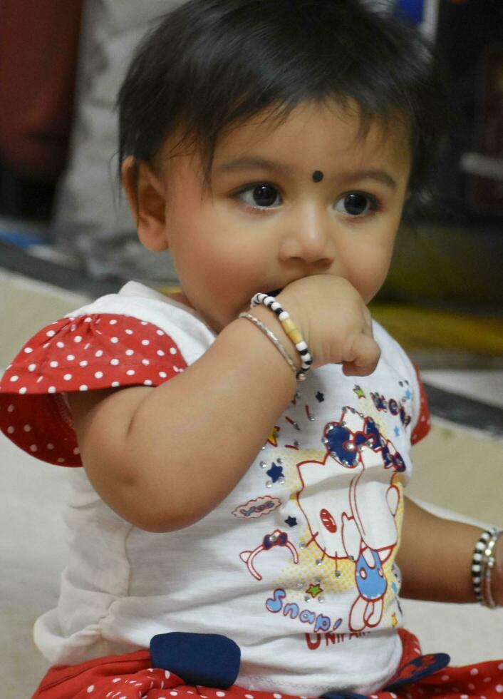 A cute Baby Girl in Joy Mood photo