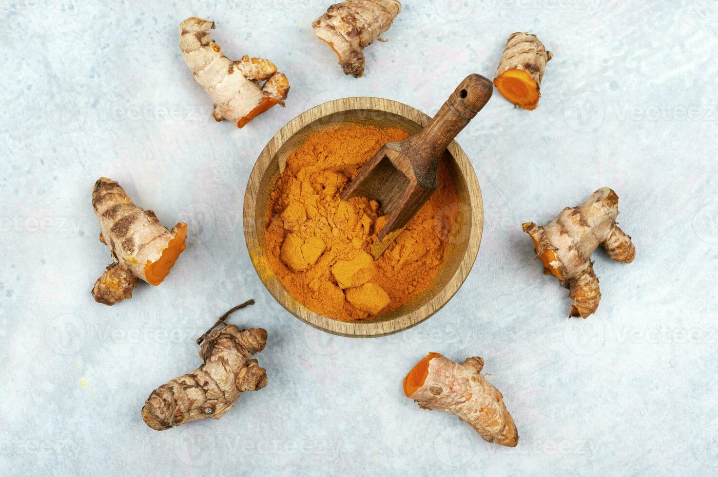 Turmeric root and turmeric powder. photo