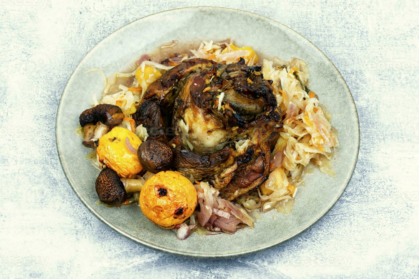 Smoked pork ham hock or shank in sauerkraut. 25266453 Stock Photo at