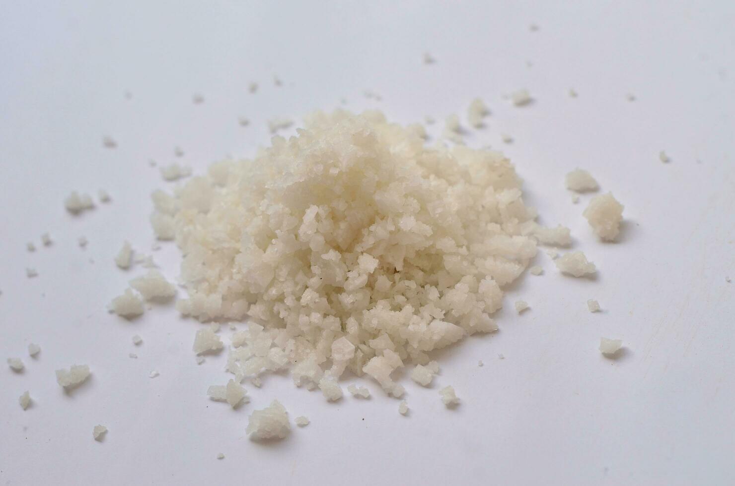 raw salt isolated at white background photo