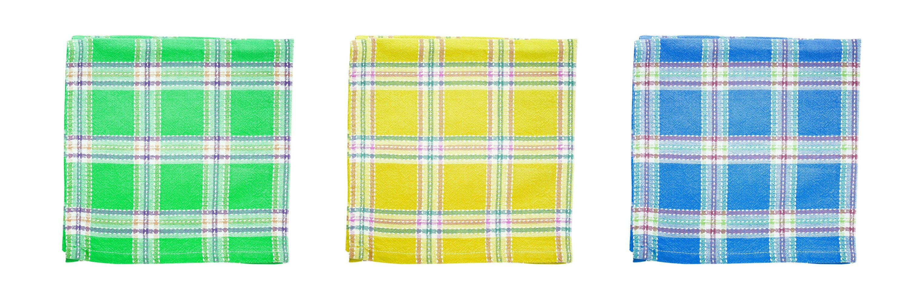 Set of colourful canvas napkins isolated on white background, perspective photo