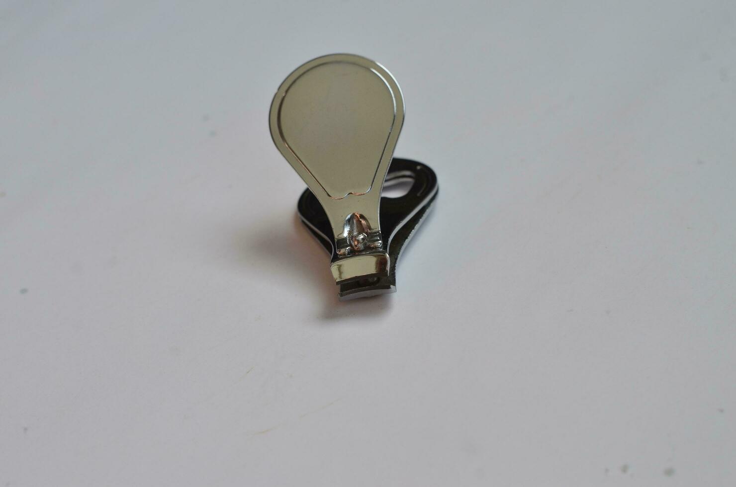 nail clipper isolated at white background photo