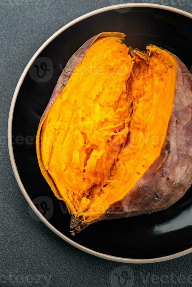 sweet potato baked vegetable meal food snack on the table copy space food background rustic top view photo
