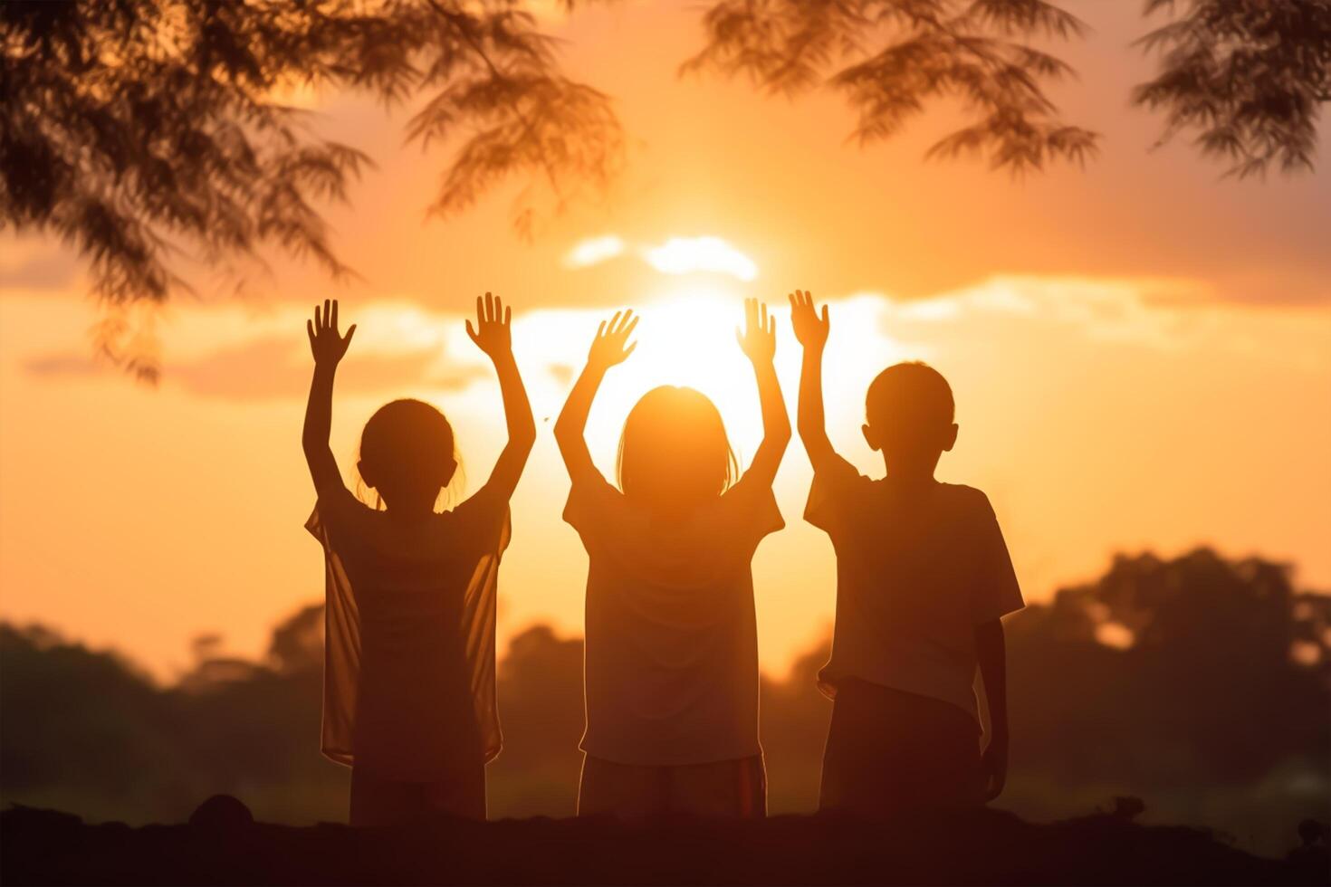 Silhouette back view refugee kids group playing in sunset. Raised hands blessing praying worship. photo