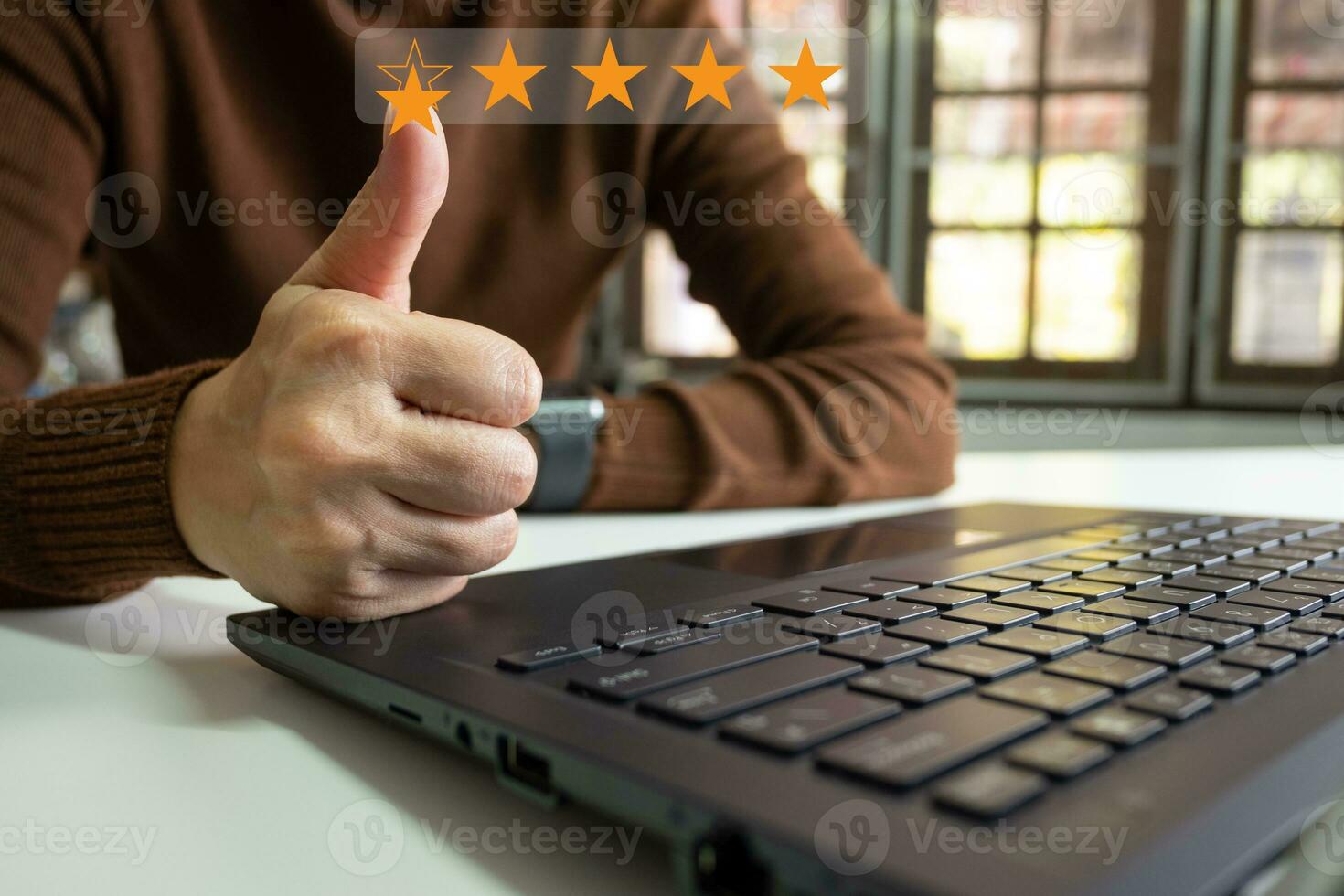 Businesswoman showing the symbol of top service 5 star quality assurance, excellent warranty, world standard, ISO certification, development and improve the quality of the organization concept. photo