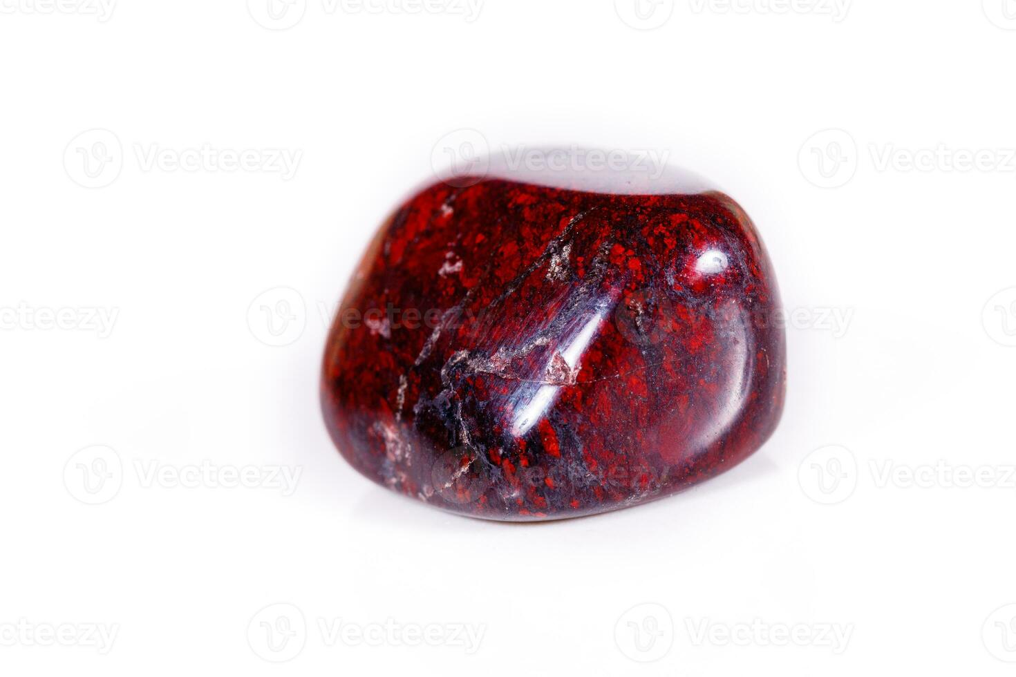 Macro mineral stone jasper hematite on white background photo