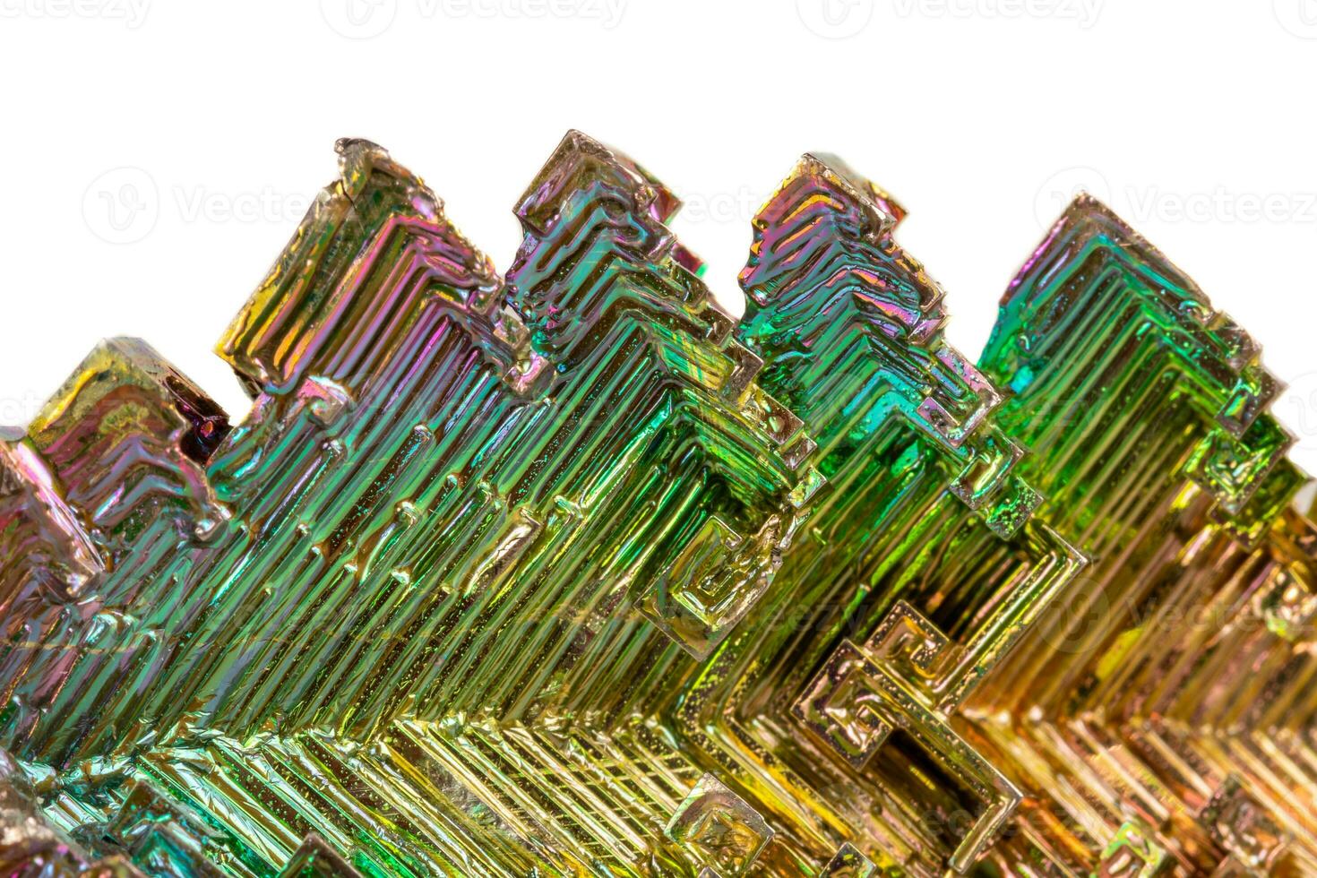 Macro of the mineral bismuth stone on a white background photo