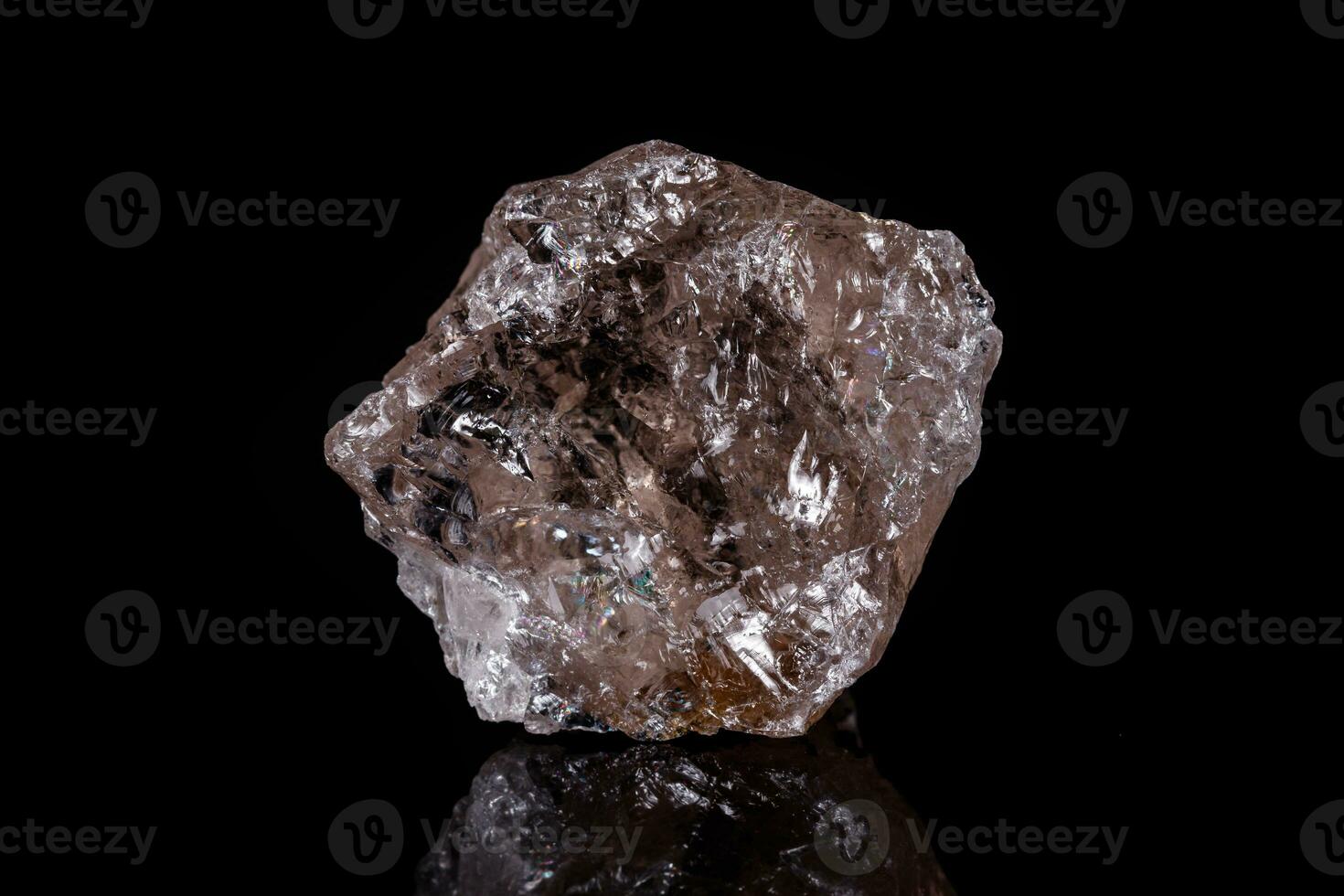 Macro mineral stone smoky quartz Rauch topaz on black background photo