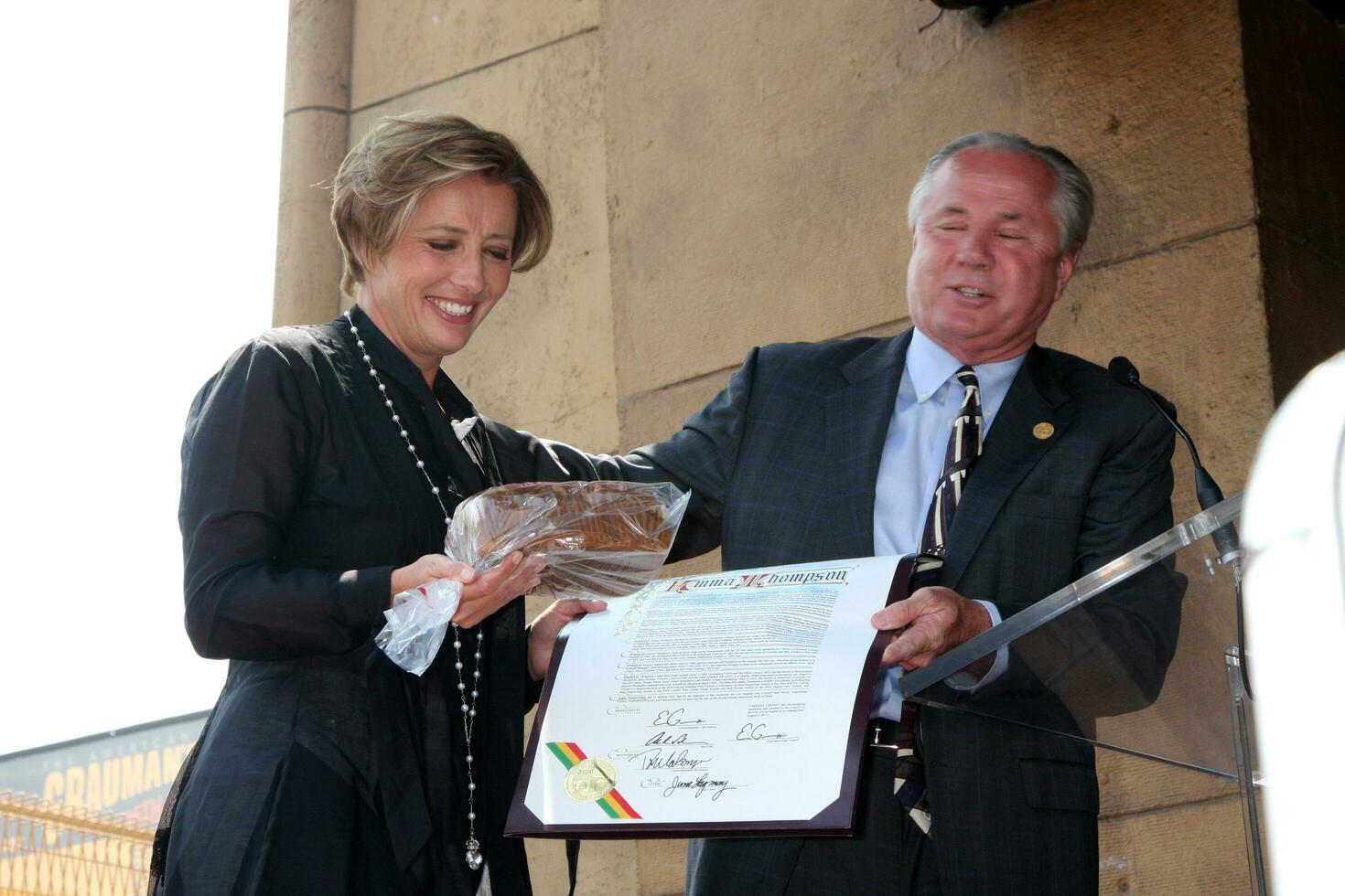 LOS ANGELES  AUGUST 5 Emma Thompson  Tom LeBonge at the Hollywood Walk of Fame Ceremony for Emma Thompson at Hollywood Walk of Fame on August 5 2010 in Los Angeles CA photo