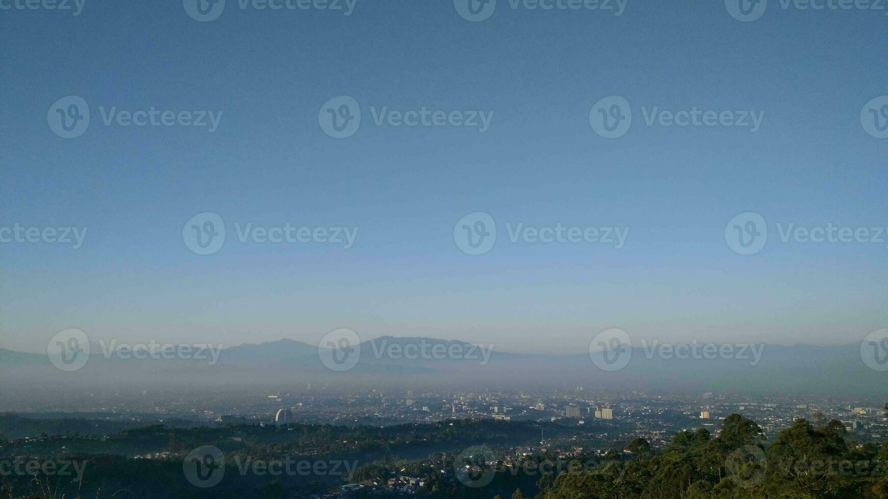 Welcome to Bandung, a city nestled among lush green hills in West Java, Indonesia. Known as the Paris of Java Bandung exudes a unique blend of natural beauty and urban charm. photo