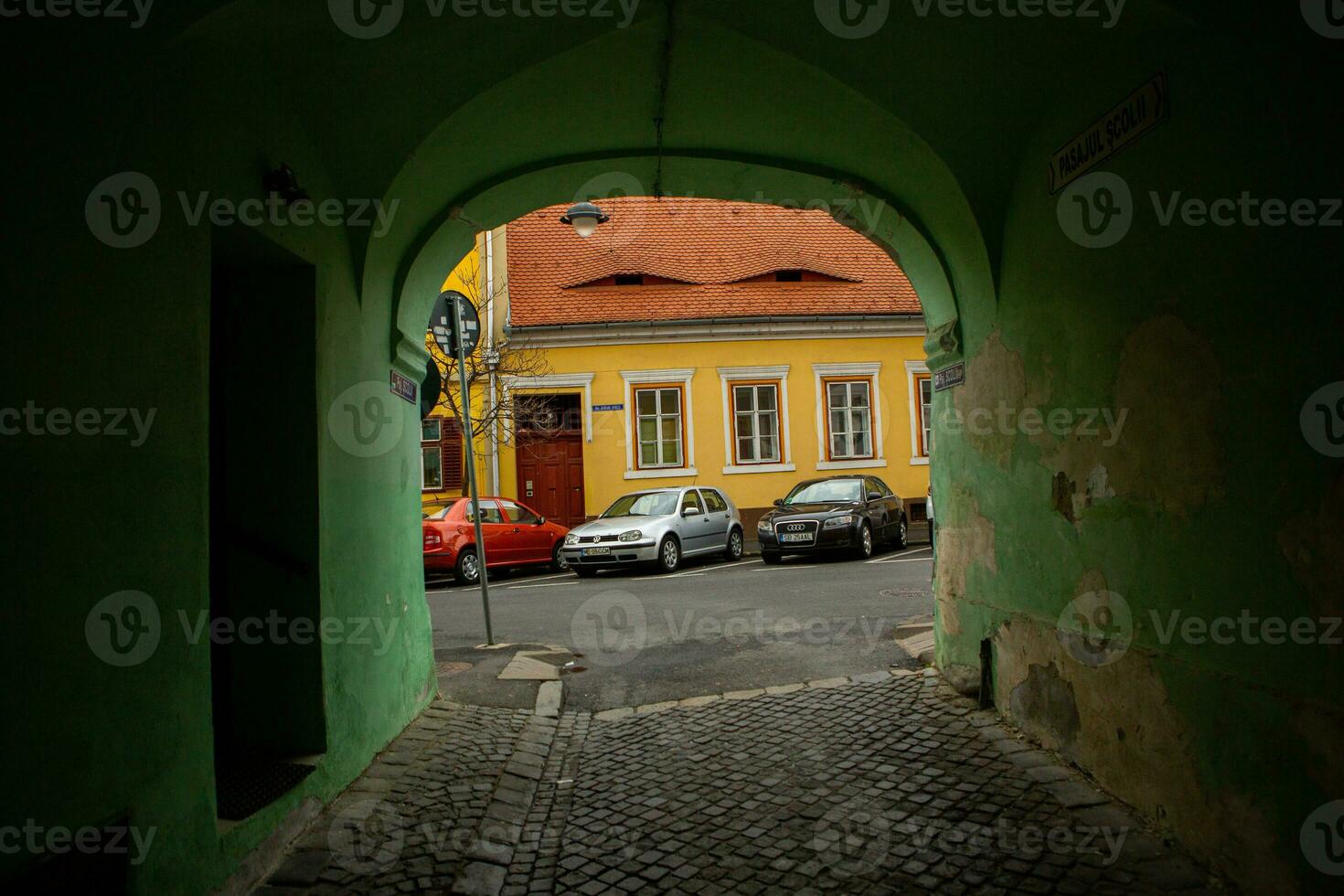 Medieval street with historical buildings in the heart of Romania. Sibiu the eastern European citadel city. Travel in Europe photo