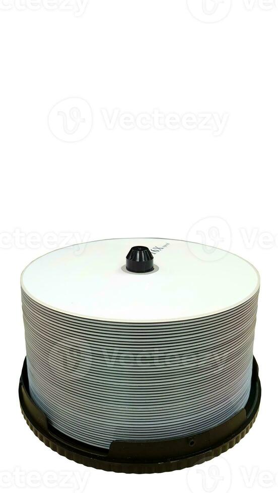 Stack pile of blank dvd or cd dics isolated, cutout, heap pf data, information concept, old technology, white background with clipping path photo