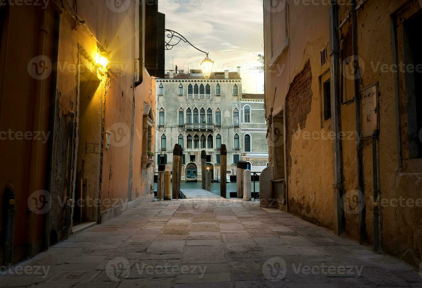 Narrow street in Venice photo