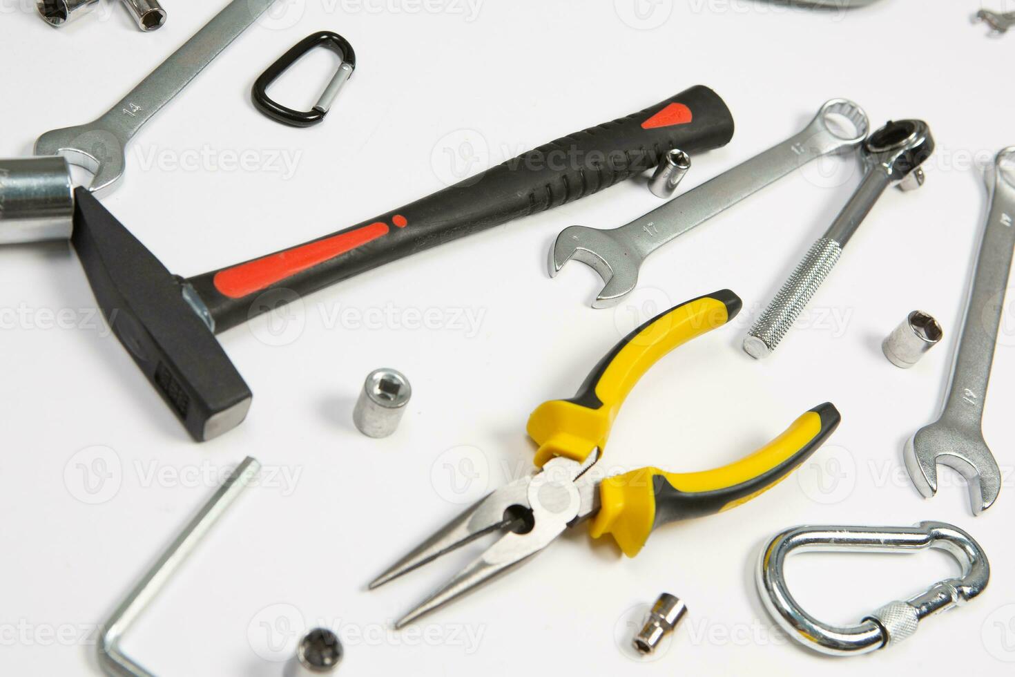 Set of tools for construction or the house. Wrench, pliers, hammer, screwdriver, flashlight, bold, scissors, knife and others. photo