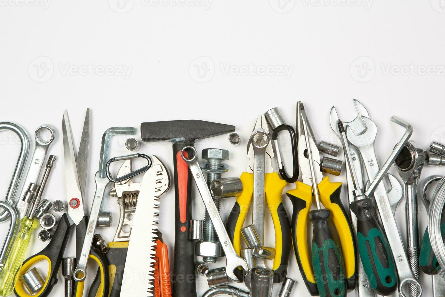 Set of tools for construction or the house. Wrench, pliers, hammer, screwdriver, flashlight, bold, scissors, knife and others. photo