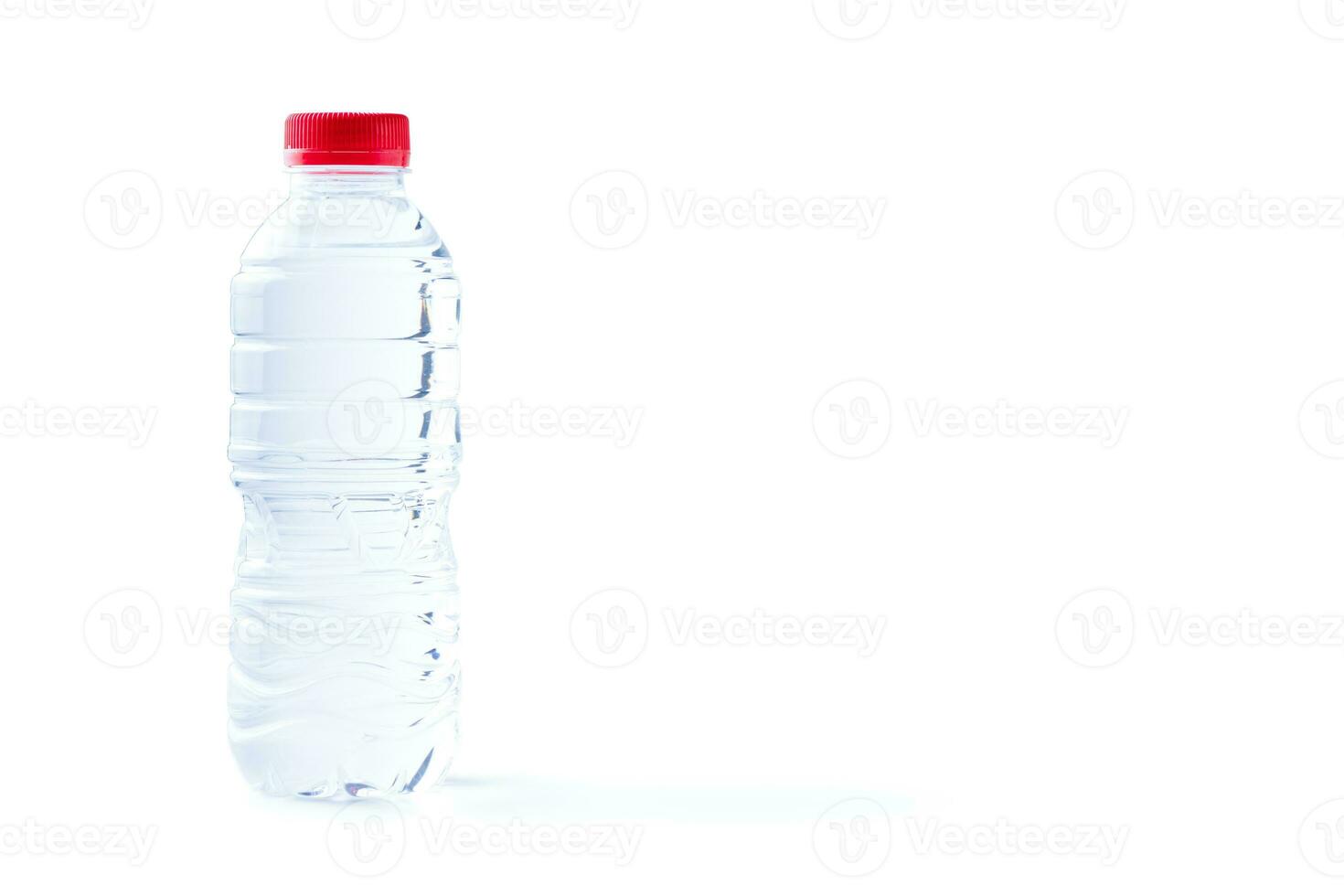 Plastic bottle of still healthy water isolated on white background photo