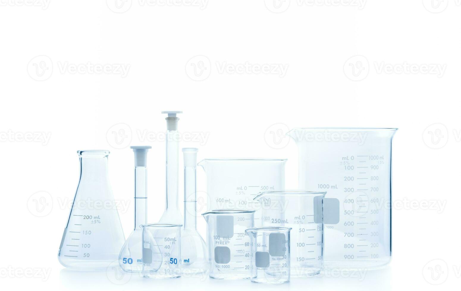 Realistic Glass Laboratory Equipment Set. Flasks and measuring beaker for science experiment in laboratory photo