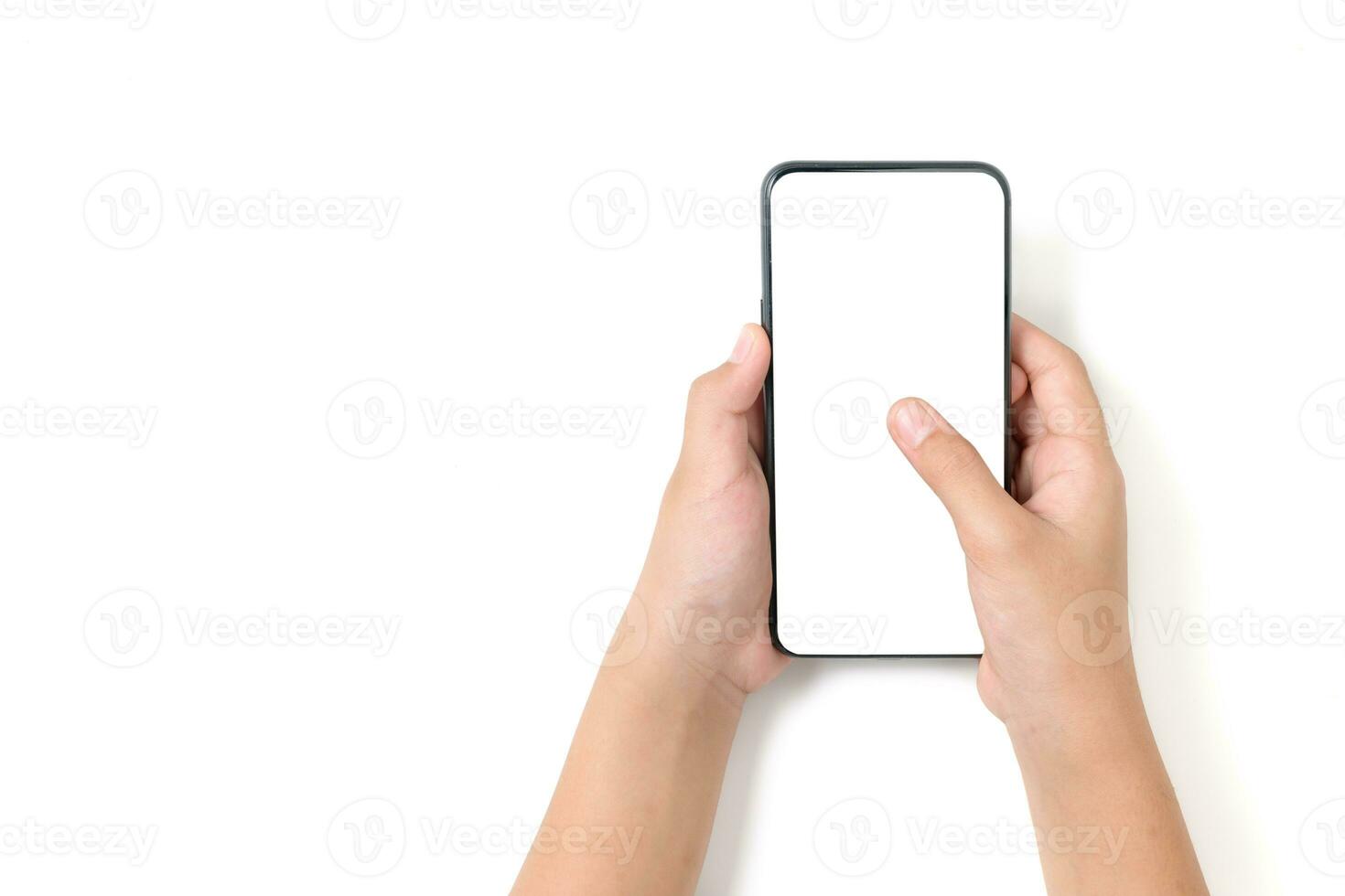 Child hand holding black smartphone with white screen for advertise or banner isolated photo
