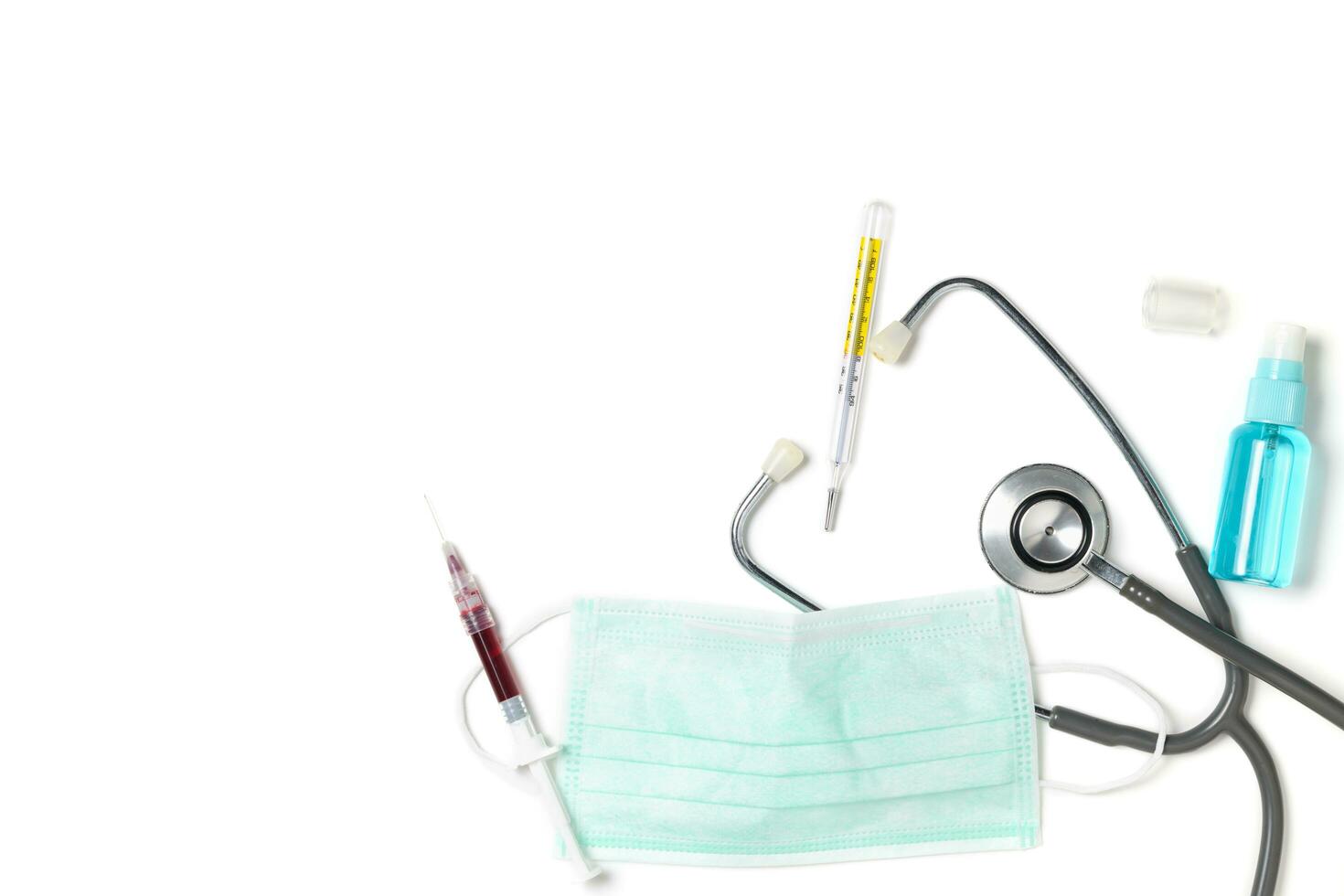 protective mask  mask with stethoscope and thermometer photo