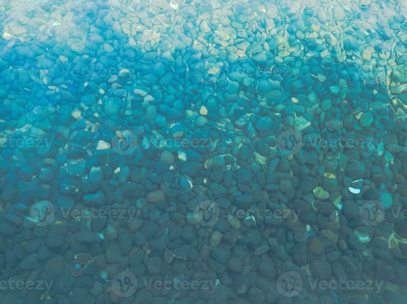 Clear water with rocks HD photo