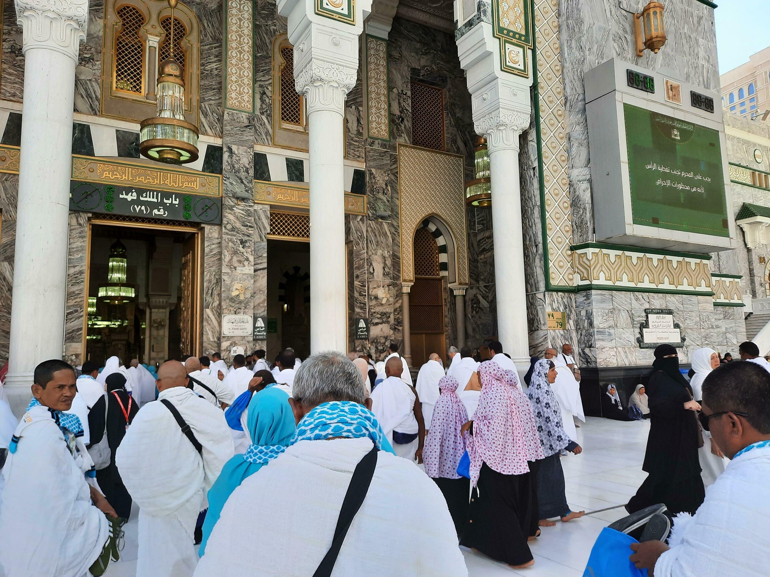 Mecca, Saudi Arabia, April 2023 Pilgrims from different countries of the world enter Masjid al