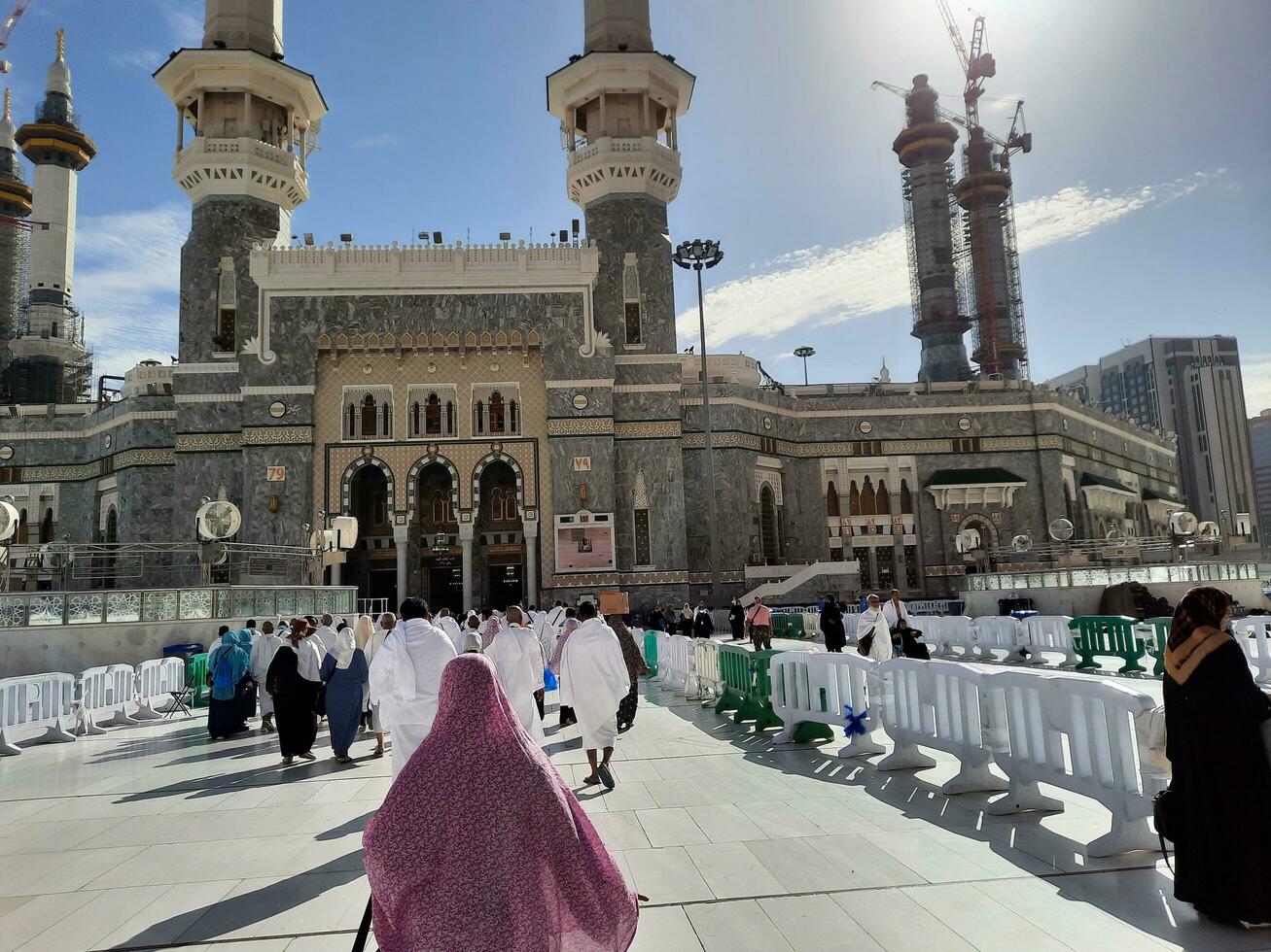 Mecca, Saudi Arabia, April 2023 - Pilgrims from different countries of the world enter Masjid al-Haram from Bab Fahd to perform Umrah at Masjid al-Haram, Mecca. photo