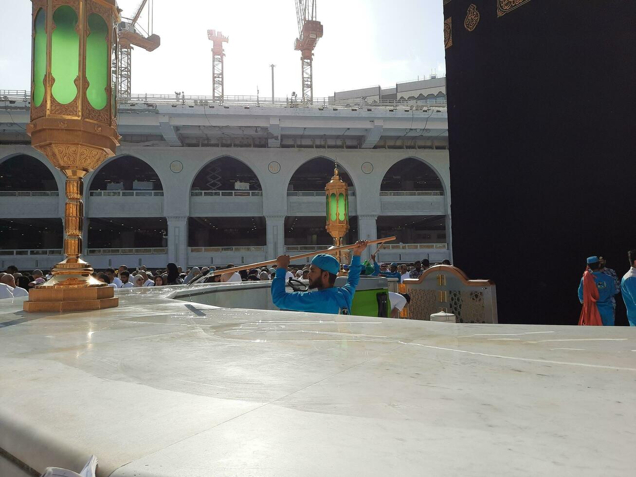 Mecca, Saudi Arabia, May 2023 - A beautiful view of cleaning Hateem during daytime near the Kaaba in the courtyard of Masjid al-Haram, Mecca. photo